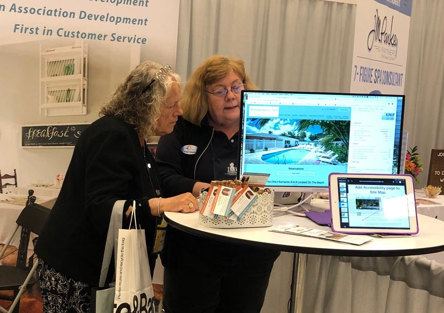 Pat and a client at the 2019 AIHP Knowledge Sharing Summit