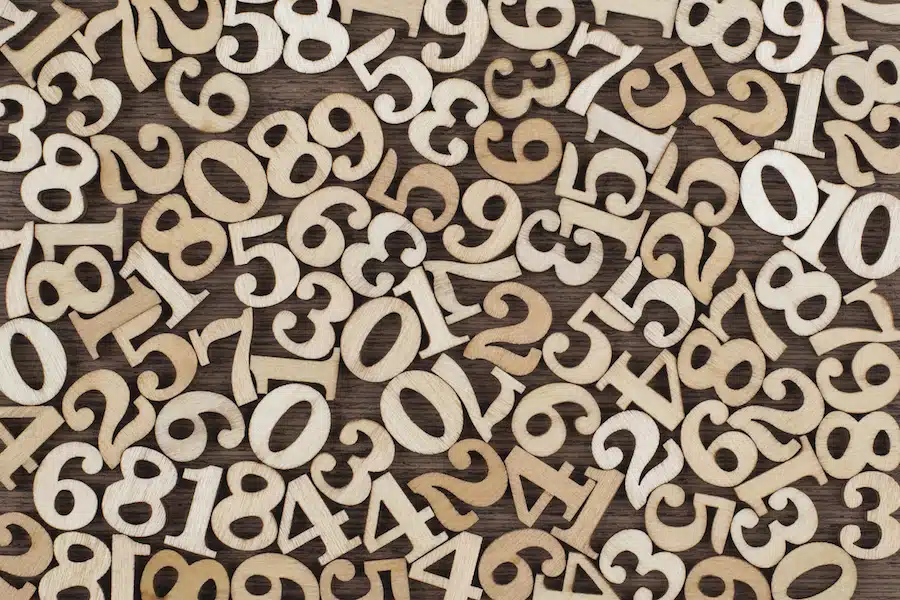 Vintage Wooden Numbers Background. Back to school concept.