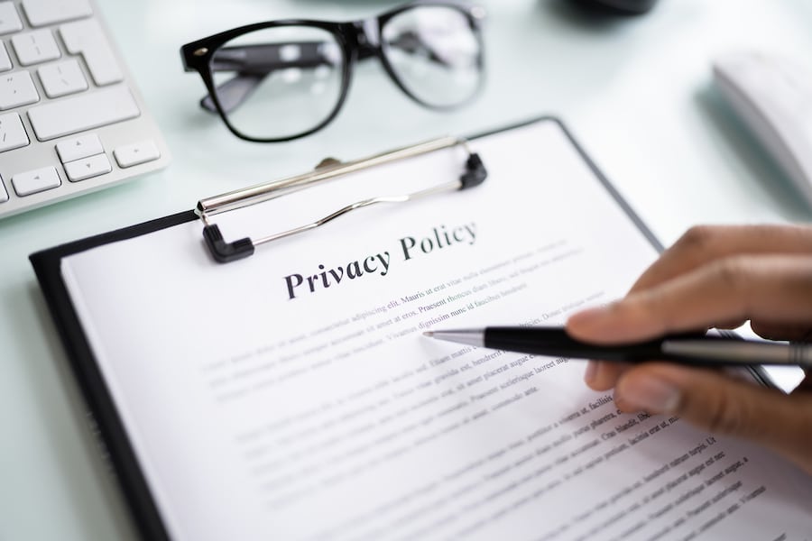Privacy Policy Notice And Legal Agreement for data collection. Man Reading Contract