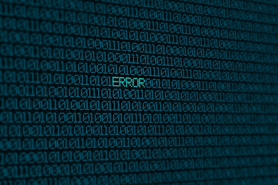 glowing blue binary code on screen with word error background concept