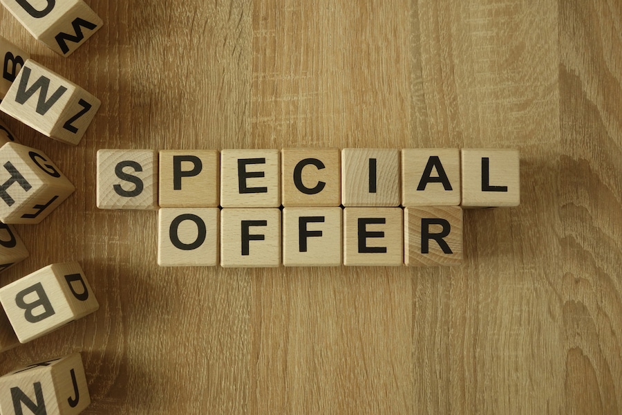 "Special Offer" spelled out in wooden blocks